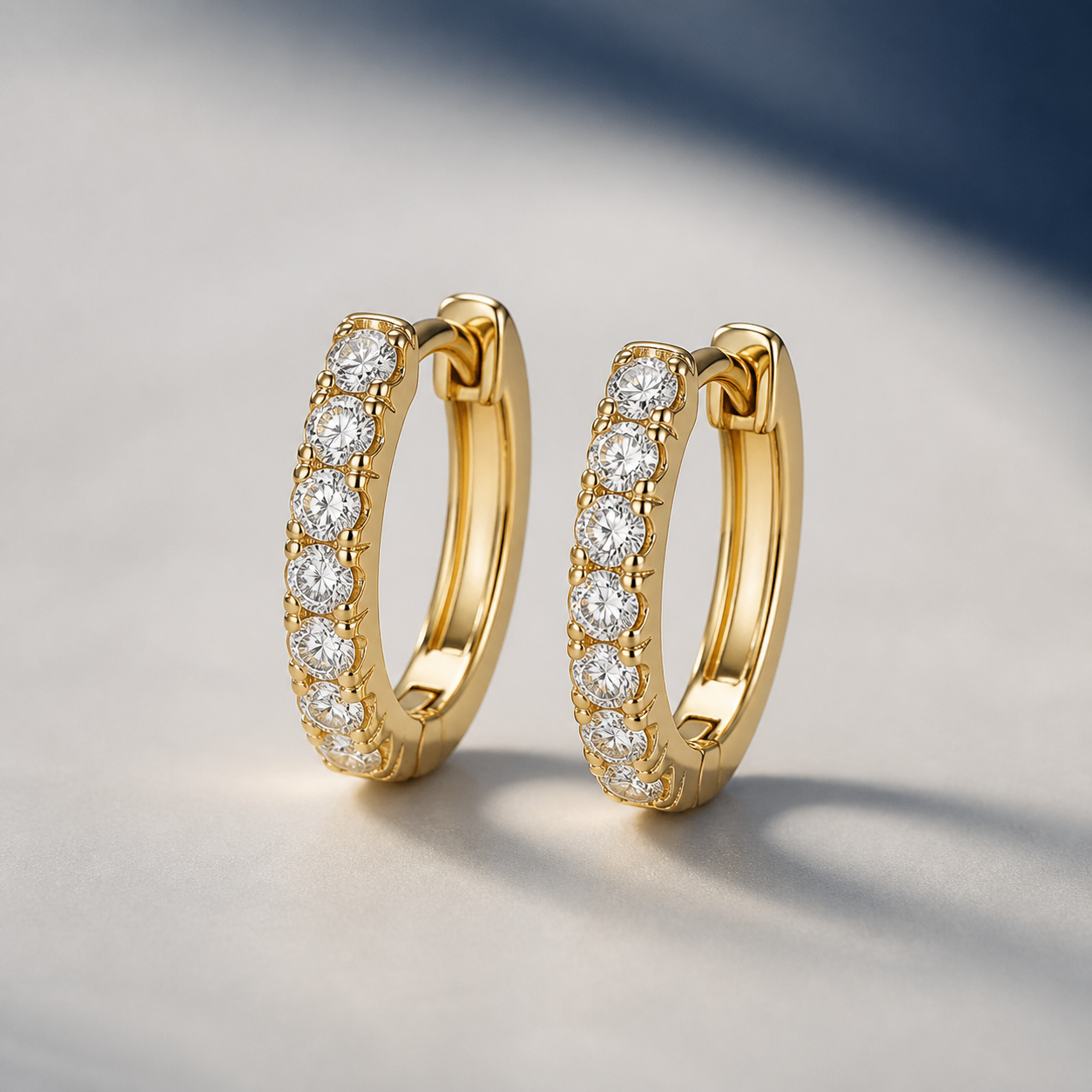 Aretes Huggie Lumière
